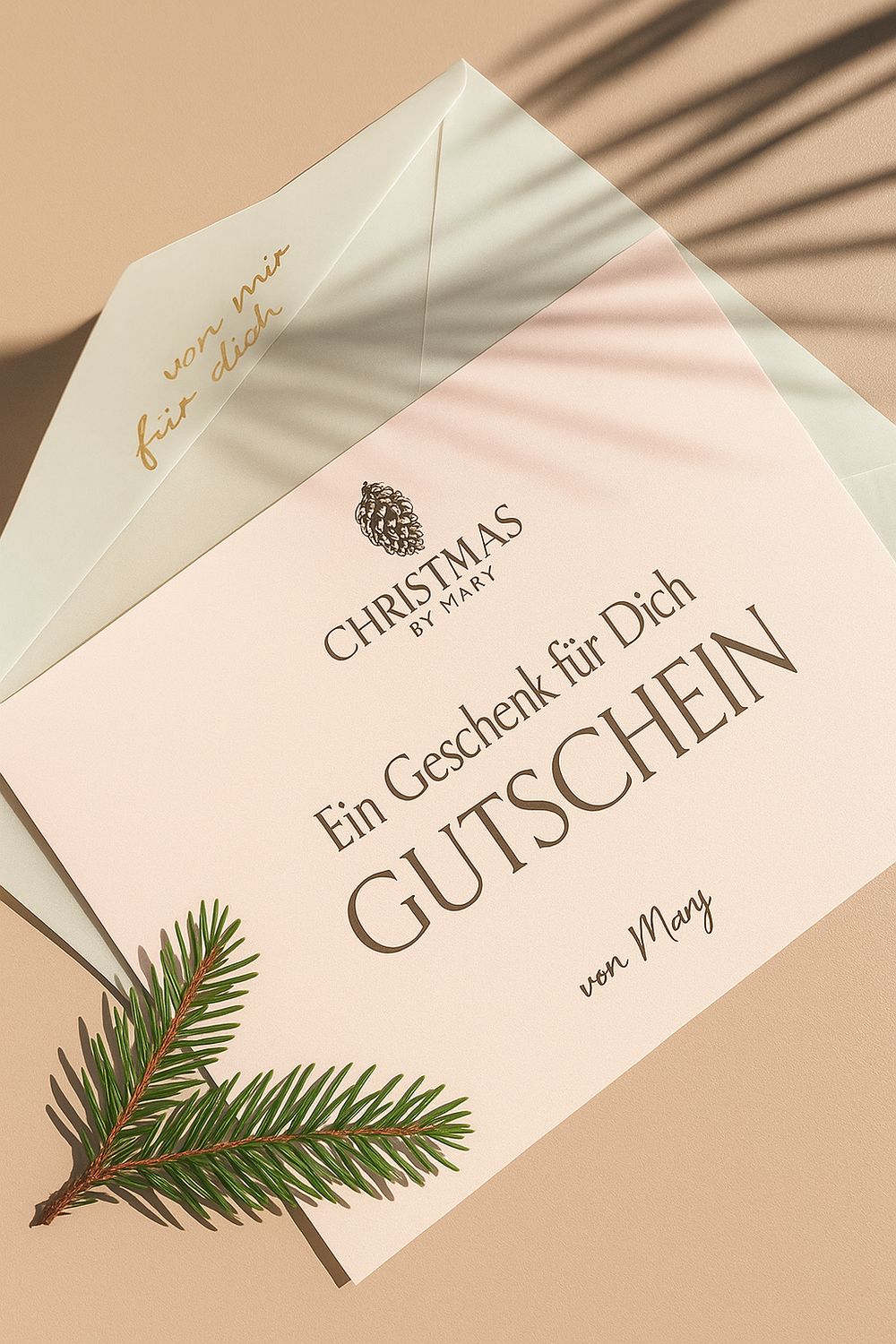 Eleganter Geschenkgutschein von Christmas by Mary mit Tannenzweig und goldenem Text in zartem Rosa und Weiß